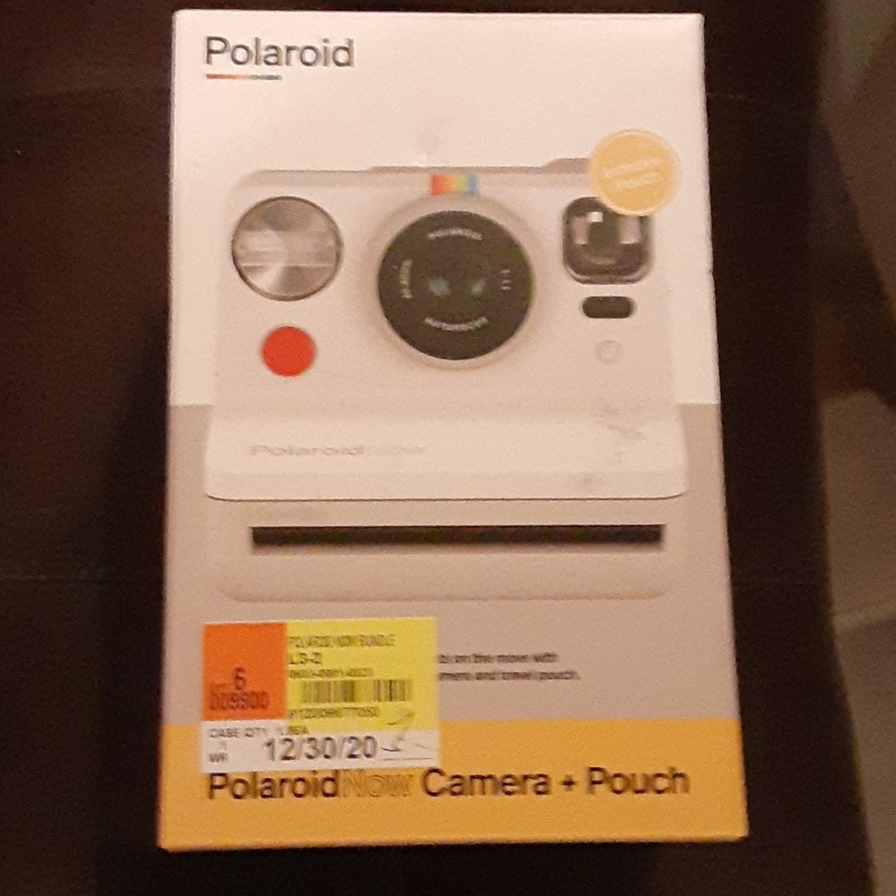 Polaroid camera and pouch